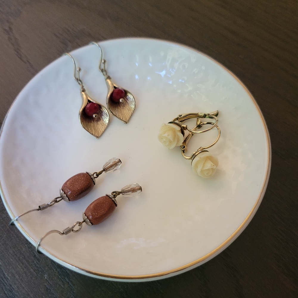 Trio of gold earrings